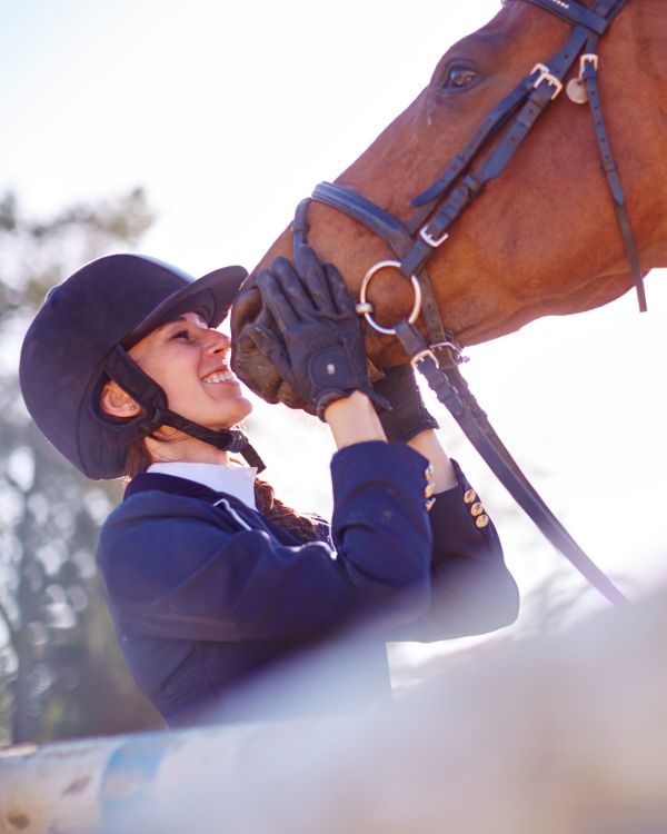 confident rider with horse